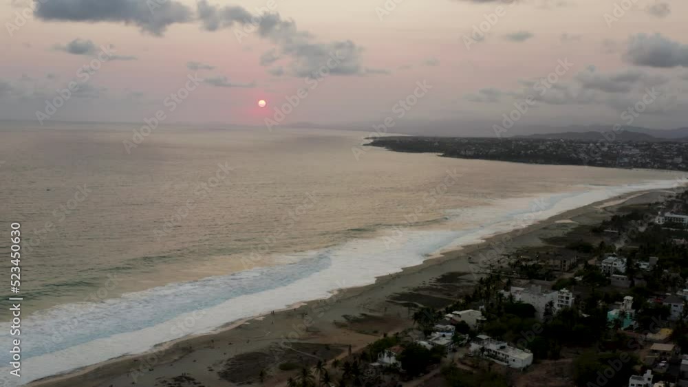 Aerial is flying over Playa Zicatela during sunset time, Puerto Escondido Mexico Aerial is flying over Playa Zicatela during sunset time, Puerto Escondido Mexico