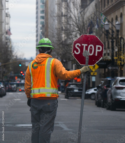 Construction Worker Directing Traffic in DT Portland