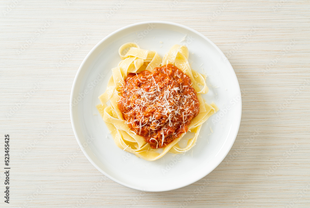 pork bolognese fettuccine pasta with parmesan cheese pork bolognese fettuccine pasta with parmesan cheese