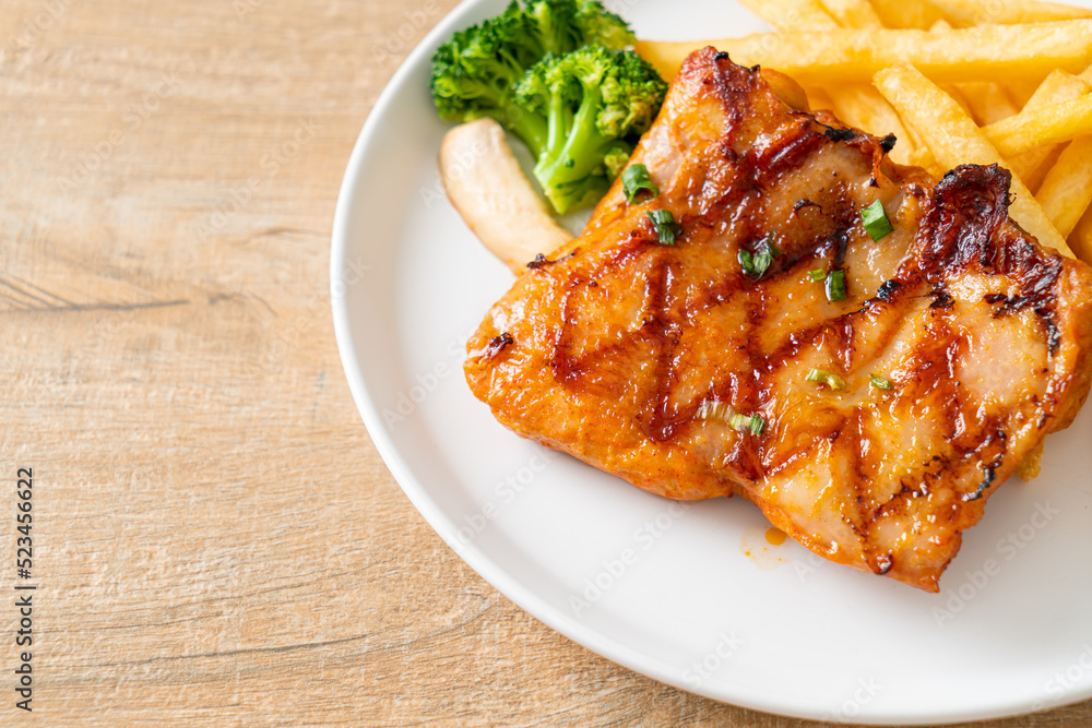 grilled chicken steak with potato chips or french fries grilled chicken steak with potato chips or french fries