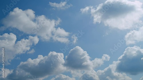 Soft white clouds. Clouds form against a dark blue sky. Blue sky white clouds. photo