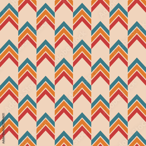 Abstract geometric seamless pattern with arrows. Arrows color vector ethnic pattern. Chevron pattern. Color vector background. © Andrey