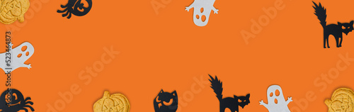 halloween website banner with ghosts and characters cats