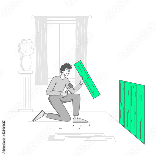 man is repairing a wall at home