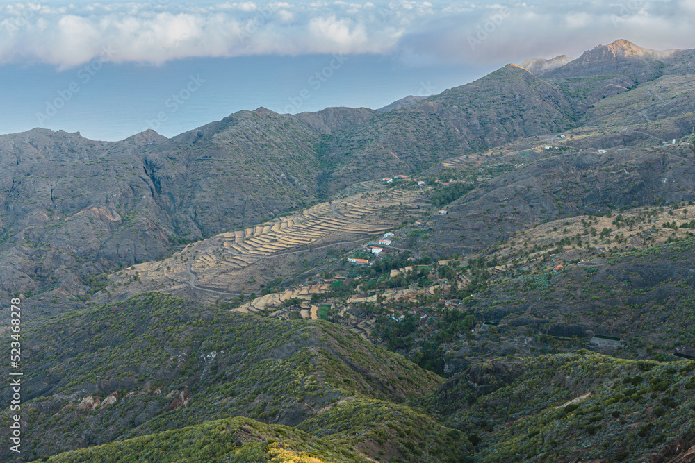 Rural landscape with mountains, fields and farms on the volcanic island of La Gomera, Canary Islands, Spain