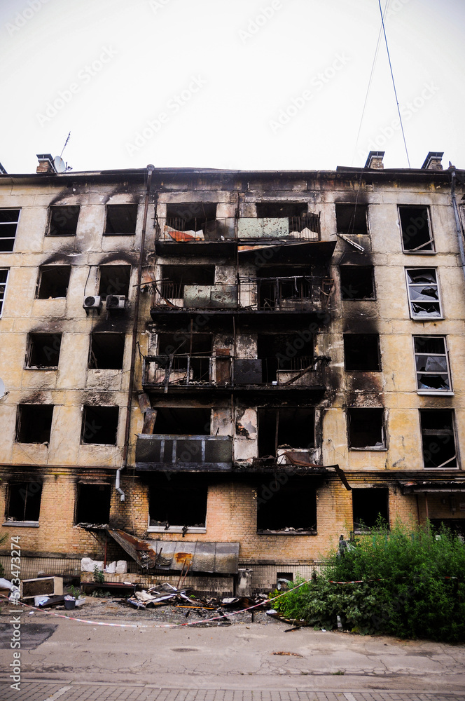 2022 Russian invasion of Ukraine. War-torn city destroyed. Damage building, destruction city. Disaster area. Ruined house after rocket bombing shelling attack. Space for text. War in Ukraine. 
