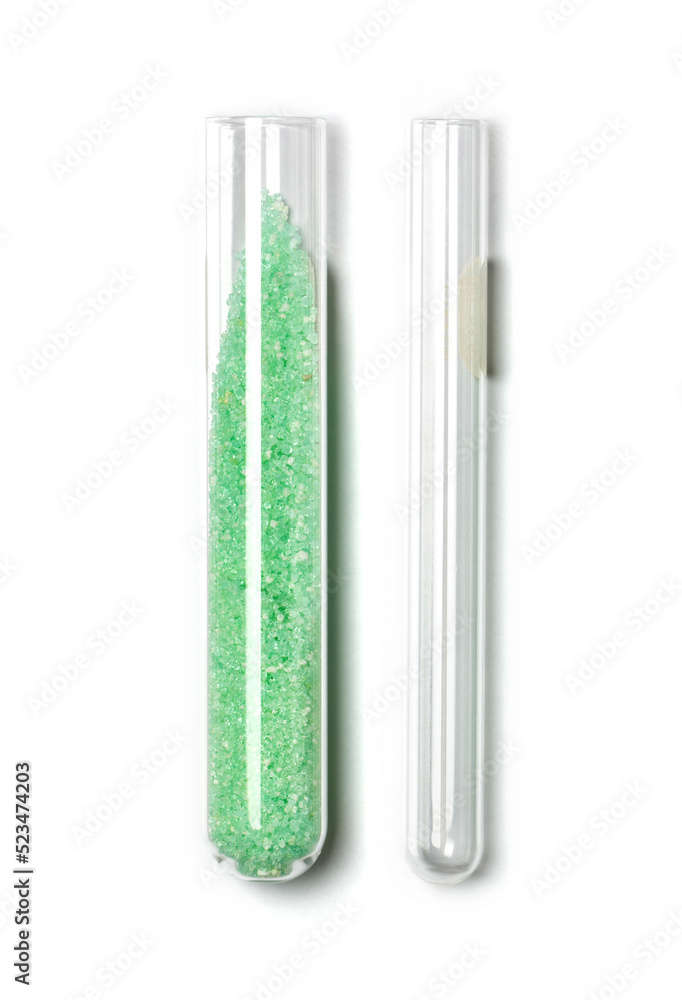 Closeup chemical ingredient on white laboratory table. Ferrous Sulfate in test tube. Closeup chemical ingredient on white laboratory table. Ferrous Sulfate in test tube.