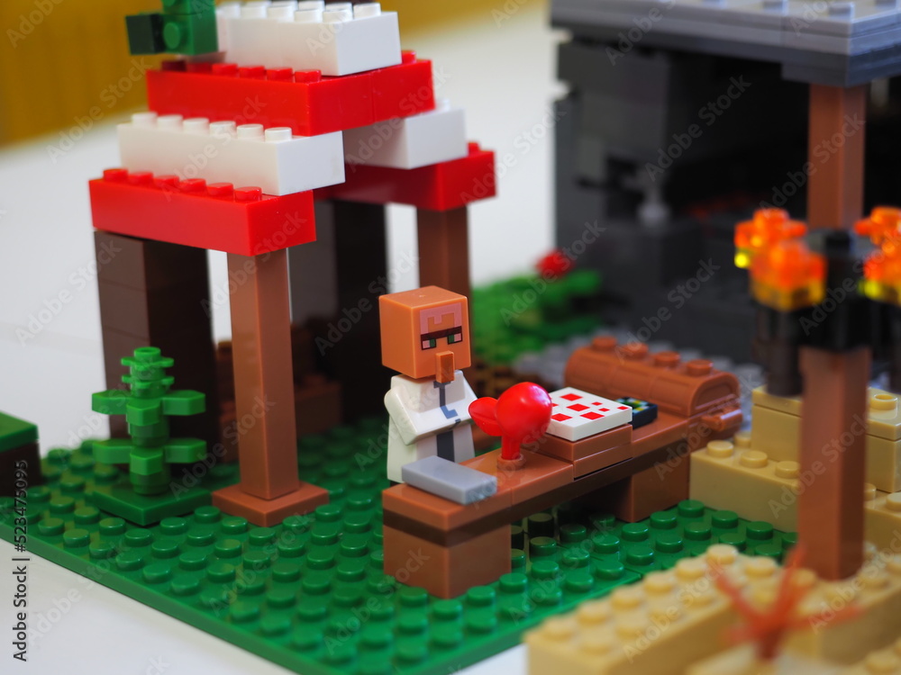 Naklejka premium Elements and fragments of Lego village world set. Characters of electronic game Minecraft. Children's designer with small details, developing motor skills and imagination.