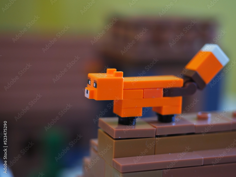 Fototapeta premium Elements and fragments of Lego village world set. Characters of electronic game Minecraft. Children's designer with small details, developing motor skills and imagination.