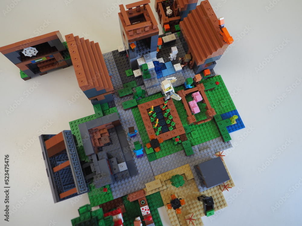 Fototapeta premium Elements and fragments of Lego village world set. Characters of electronic game Minecraft. Children's designer with small details, developing motor skills and imagination.