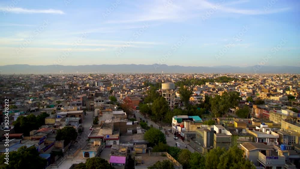 Slow Motion kite flying festival Basant in Pakistan in the evening with city from the top view Slow Motion kite flying festival Basant in Pakistan in the evening with city from the top view
