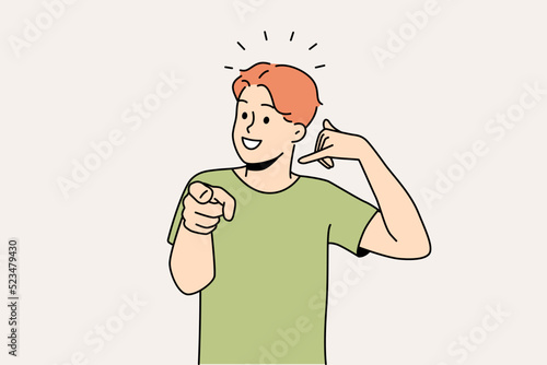 Smiling guy making hand gesture asking to call back. Happy man demonstrate callback sign. Nonverbal communication. Vector illustration. 