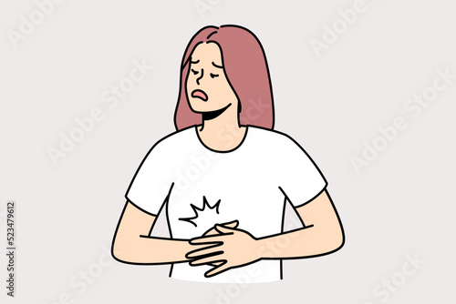 Unhealthy young woman suffer from acute stomachache. Unwell female struggle with belly pain or spasm. Healthcare. Vector illustration. 