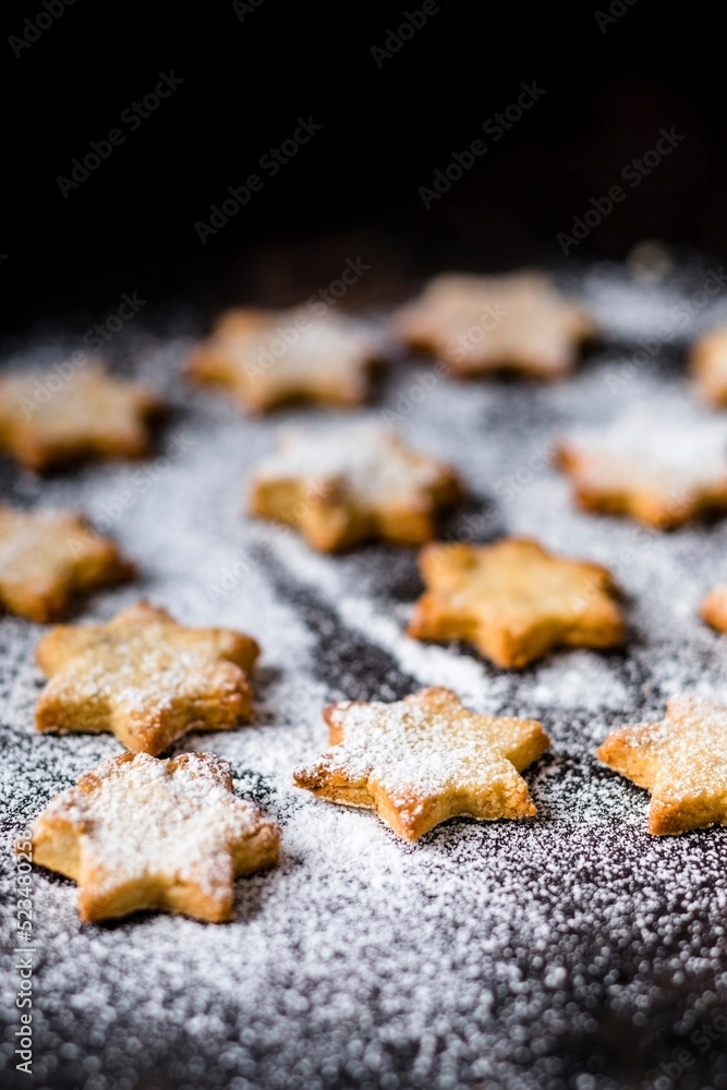 Studio shot of star shaped cookies with powdered sugar Studio shot of star shaped cookies with powdered sugar