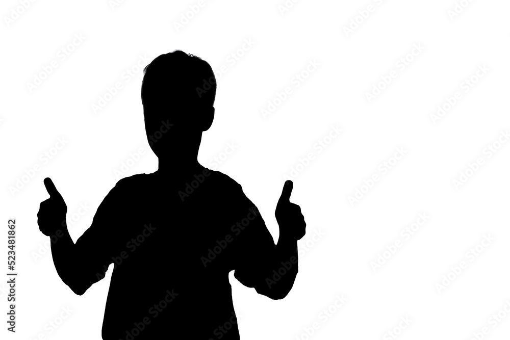 Black silhouette teenager that everything is fine, isolated white background. Winner teen boy raised hands in honor of victory. Silhouettes contour of guy holds thumbs up fingers and looking at camera
