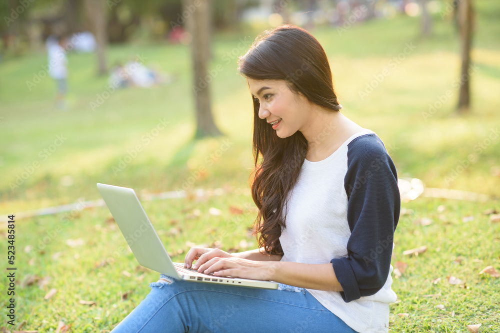 young girl with laptop outdoors young girl with laptop outdoors
