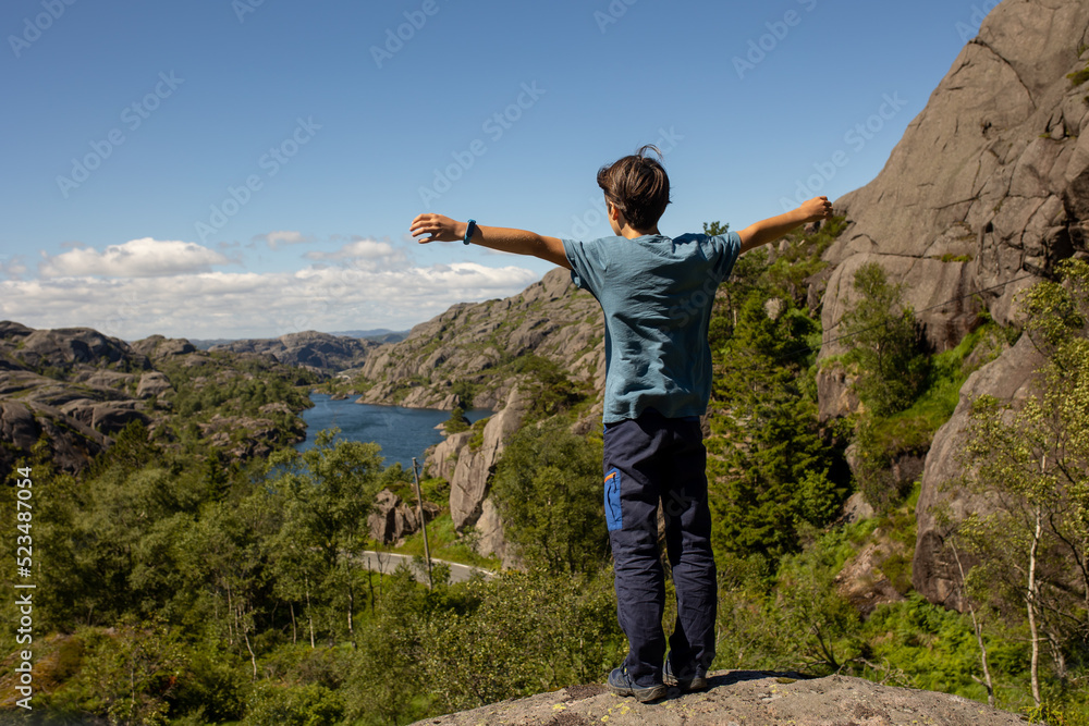Happy people, enjoying amazing views in South Norway coastline, fjords, lakes, beautiful nature Happy people, enjoying amazing views in South Norway coastline, fjords, lakes, beautiful nature