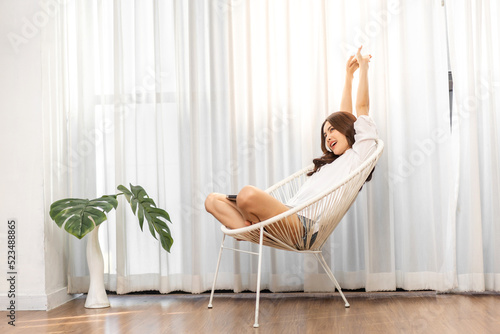 Portrait of smiling cheerful beautiful pretty asian woman clean fresh healthy white skin posing smile in pajamas white clothes.Girl felling relax and enjoy time at home.asia beauty