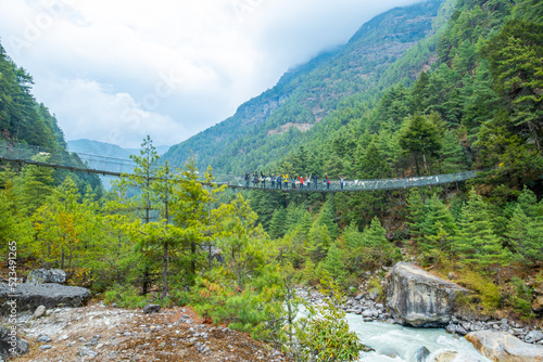 Hikers on the way from Lukla to Namche Bazar on the trek to the Everest Base Camp, Nepal. photo