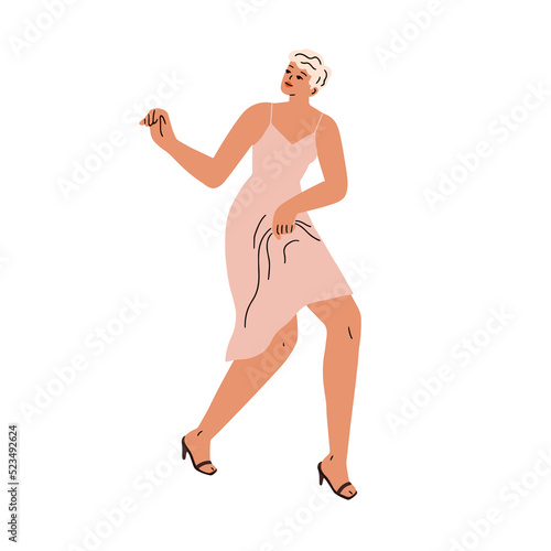 Elegant woman dancing, moving, swinging to music. Smiling female dancer. Posi...