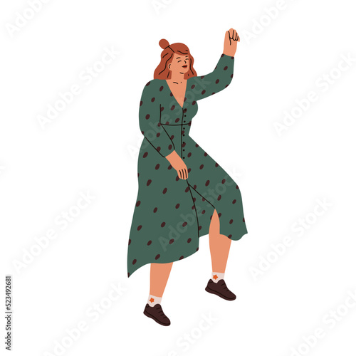 Happy modern woman dancing with joy. Young smiling girl moving to music. Fema...