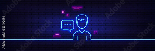 Neon light glow effect. User communication line icon. Male Person with chat speech bubble sign. Human silhouette symbol. 3d line neon glow icon. Brick wall banner. Person talk outline. Vector