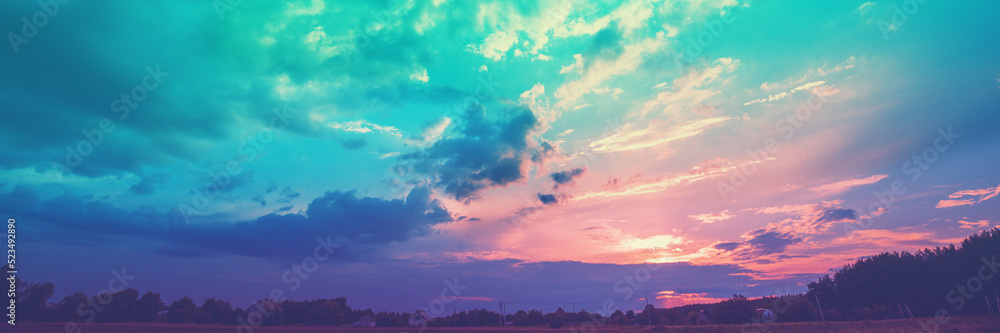 Rural landscape with beautiful gradient evening sky at sunset. Horizontal banner