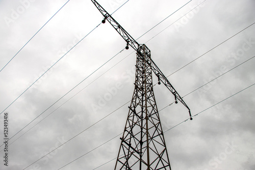 Transmission line, power line stand with stormy sky.