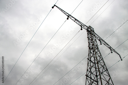 Transmission line, power line stand with stormy sky.