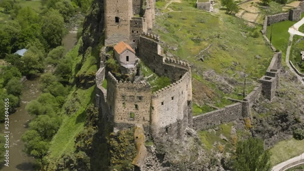 Flying Towards The Historical Georgian Monument Of Khertvisi Fortress In Aspindza Municipality, Southern Georgia. Aerial Drone Shot Flying Towards The Historical Georgian Monument Of Khertvisi Fortress In Aspindza Municipality, Southern Georgia. Aerial Drone Shot