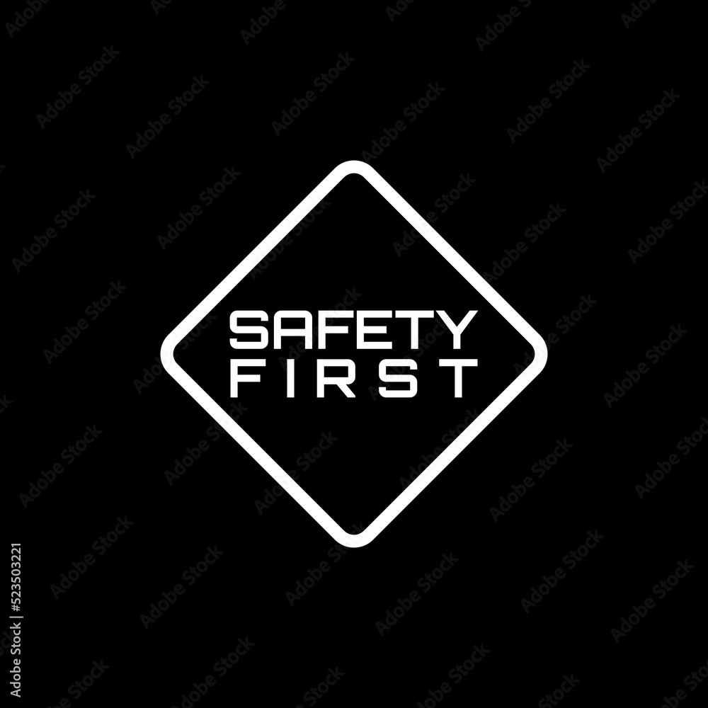 Safety First sign isolated on dark background Safety First sign isolated on dark background