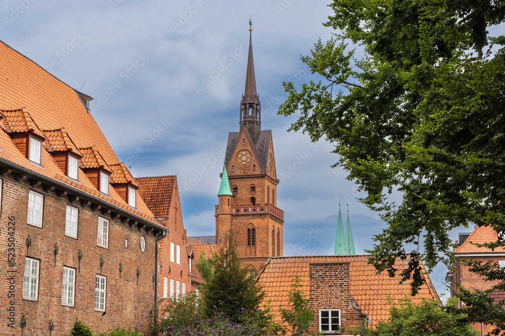Lubeck, Germany - July 30, 2022: Cityscape with ancient church in Lubeck in schleswig-holstein in northern Germany