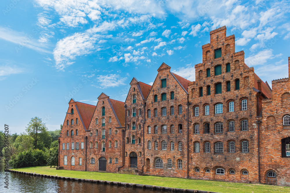 Cityscape with ancient building row of buildings called Salzspeicher in Lubeck in schleswig-holstein in northern Germany Cityscape with ancient building row of buildings called Salzspeicher in Lubeck in schleswig-holstein in northern Germany