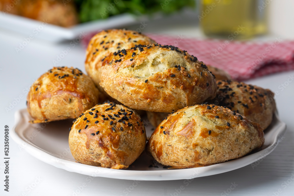 Delicious Turkish food; dill cheese pastry, Turkish name; dere otlu peynirli pogaca Delicious Turkish food; dill cheese pastry, Turkish name; dere otlu peynirli pogaca