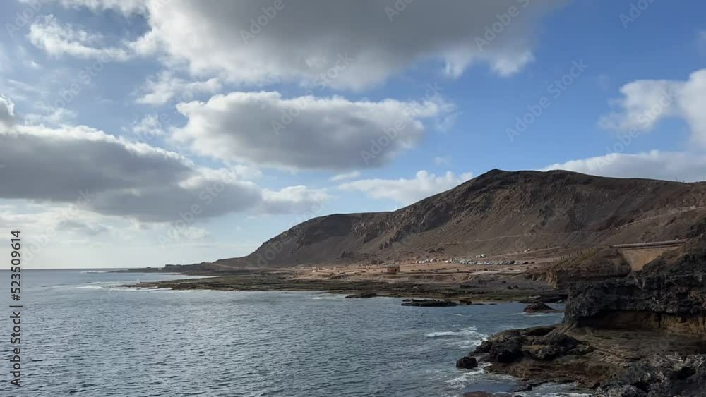 Landscape volcanic El Confital beach, Gran Canaria (Canary Islands), Spain. TIMELAPSE. Landscape volcanic El Confital beach, Gran Canaria (Canary Islands), Spain. TIMELAPSE.