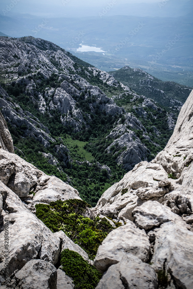 view from the pass below the peak Tulove Grede in Croatia, Velebit Mountains, a lot of rocks
