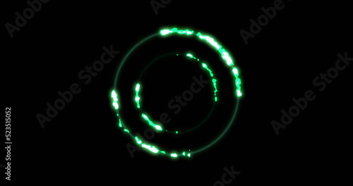Image of glowing green circles over black background
