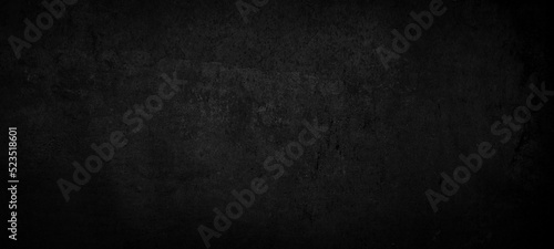 Gray black anthracite grunge scratched cement concrete wall texture background pattern © Corri Seizinger