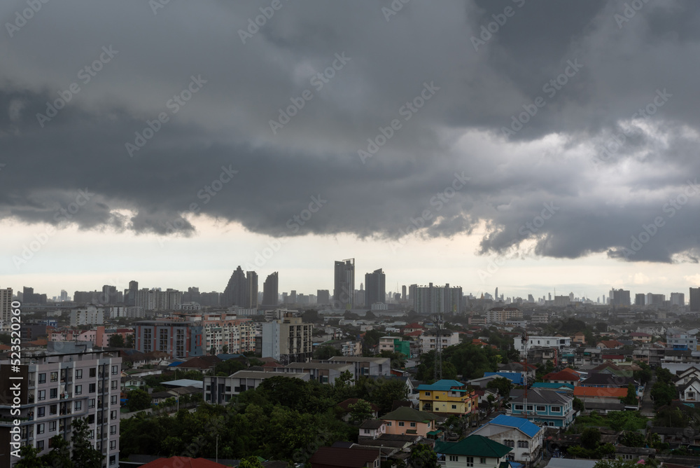 dark storm clouds over city