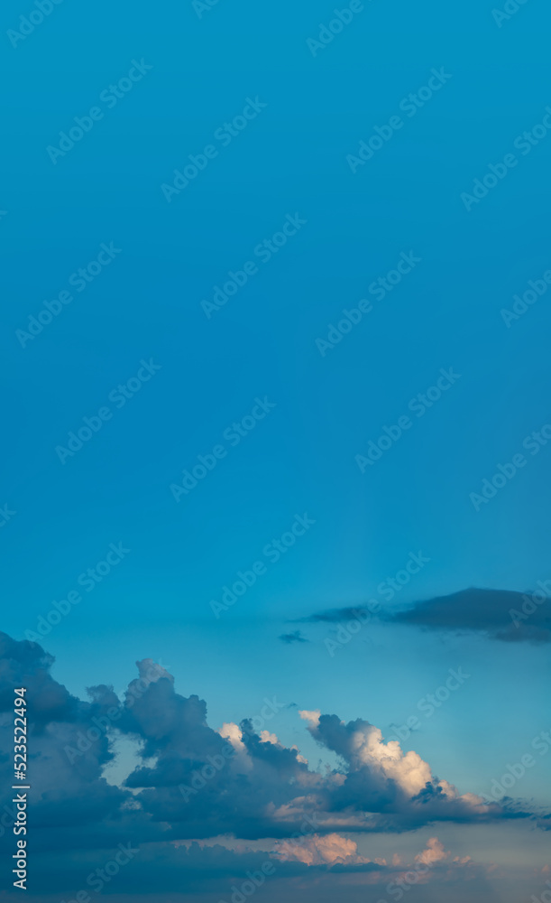 Fantastic clouds against blue sky, panorama