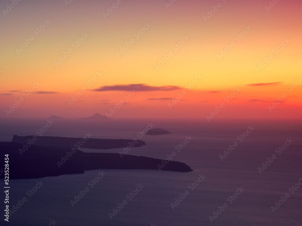 Aerial view with surreal colors sunset. Santorini island, Greece