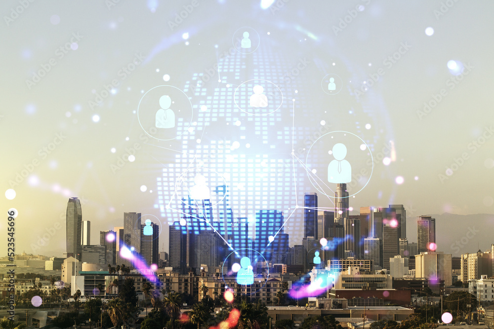 Virtual social network media hologram and world map on Los Angeles cityscape background. Double exposure