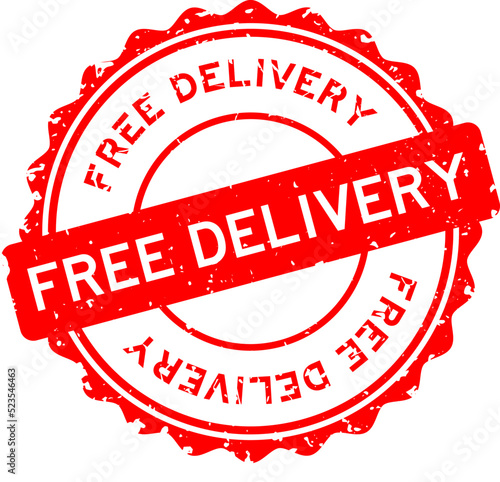 Grunge red free delivery word round rubber seal stamp on white background