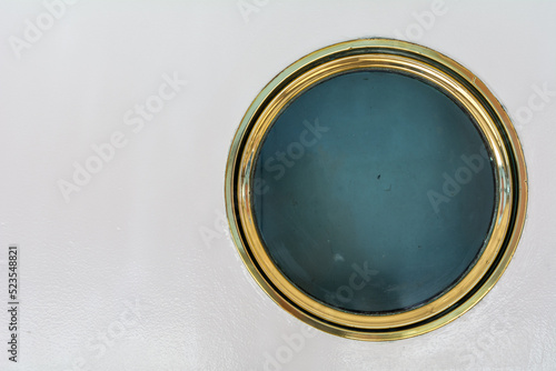 A Bull's eye window on a ship with copy space