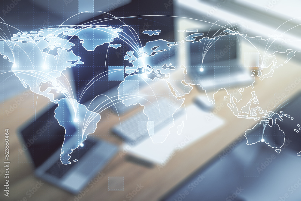 Abstract graphic digital world map with connections and modern desktop with pc on background, globalization concept. Multiexposure Abstract graphic digital world map with connections and modern desktop with pc on background, globalization concept. Multiexposure