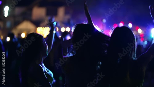 4K Group of Asian woman celebrating and dancing together at tropical island beach full moon party at night. Happy girl friends enjoy outdoor lifestyle beach holiday summer travel vacation in Thailand