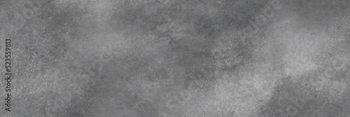 Dark gray grey anthracite black scratched damaged slate, shale natural stone concrete texture background banner panorama