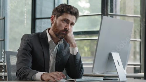 Tired lazy napping yawn adult bearded man male manager worker bored at work project online in computer in office Caucasian mature ill businessman need energy asleep feel overworked exhaustion syndrome