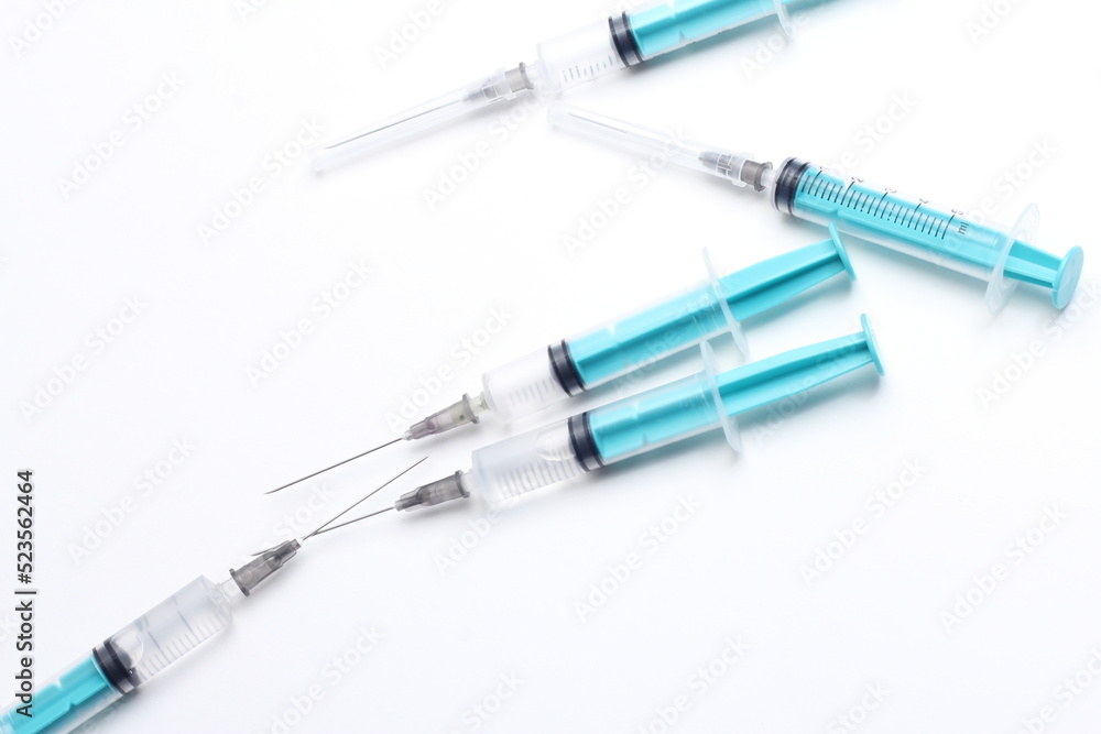 Fototapeta premium Disposable plastic syringe isolated on white