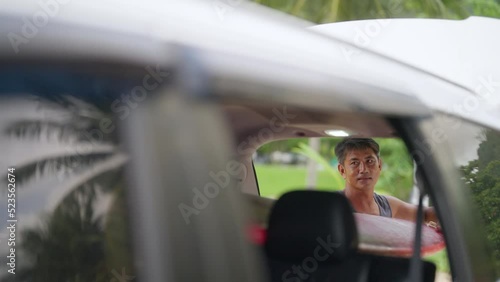 Wallpaper Mural Healthy Asian senior man surfer taking off surfboard from car trunk at the beach in sunny day. Wellness elderly retired male enjoy outdoor activity lifestyle and water sport surfing on summer vacation Torontodigital.ca